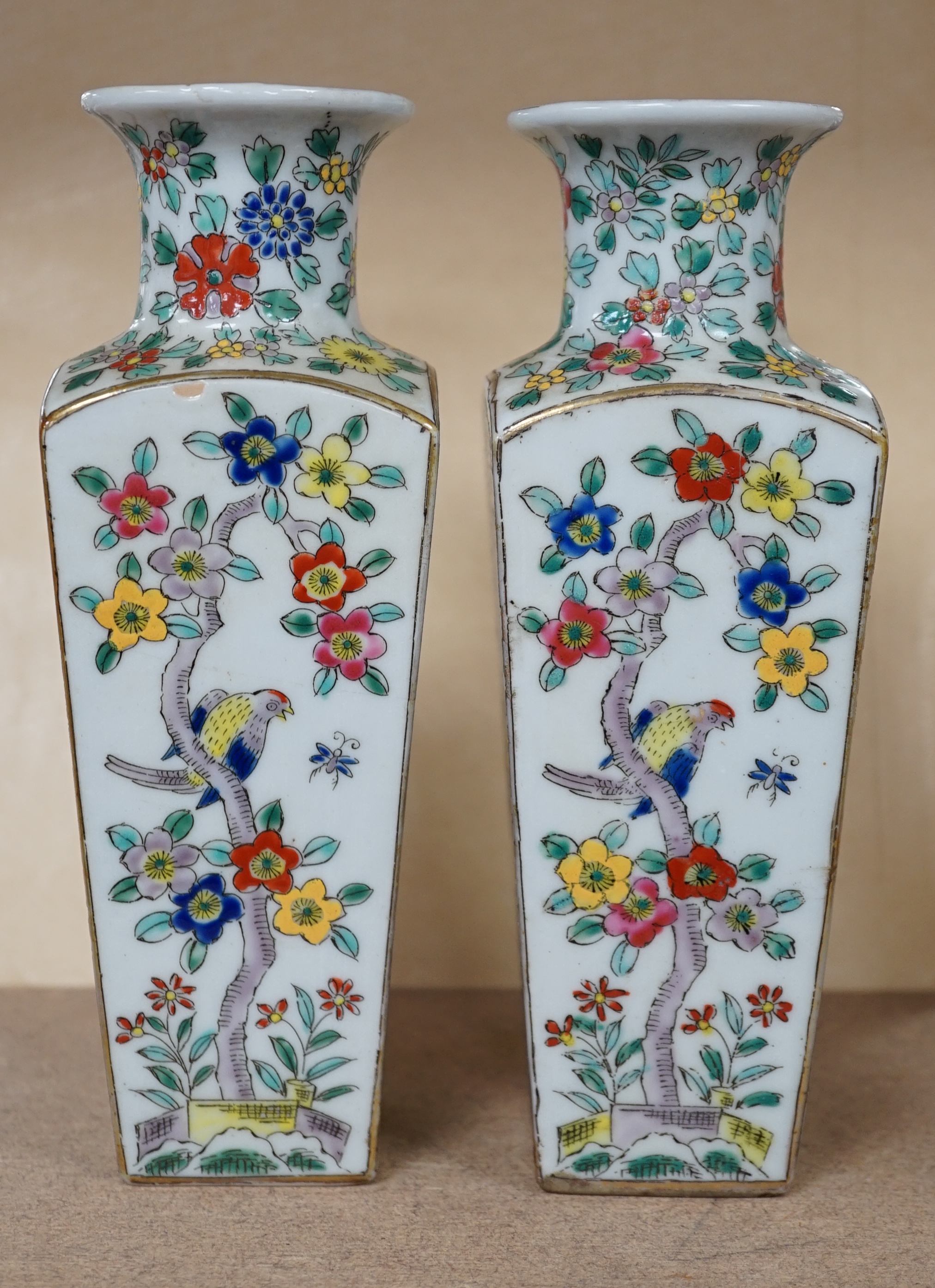 A pair of Japanese floral enamelled square tapering porcelain vases, 18cm high. Condition - good